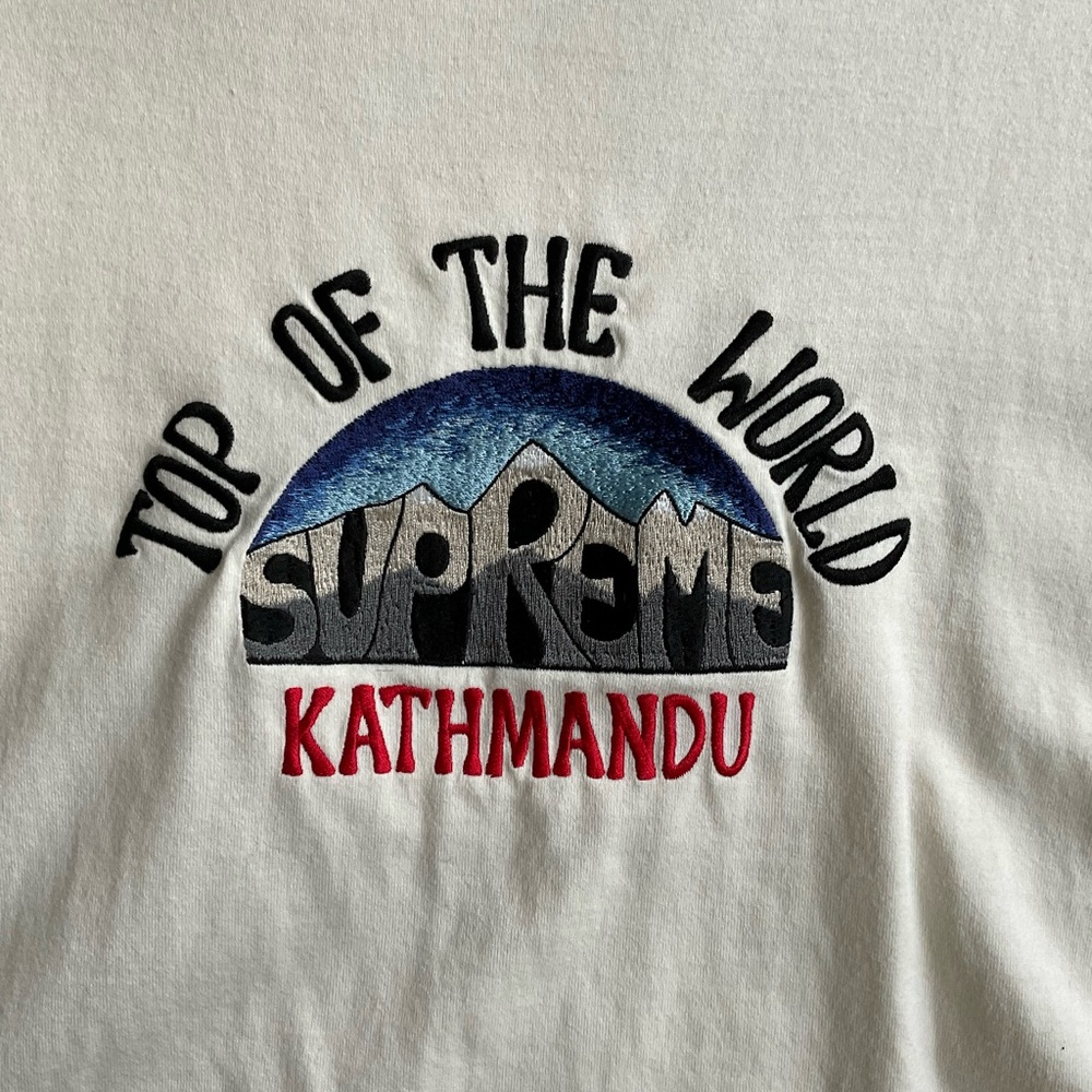 Supreme shirt.
